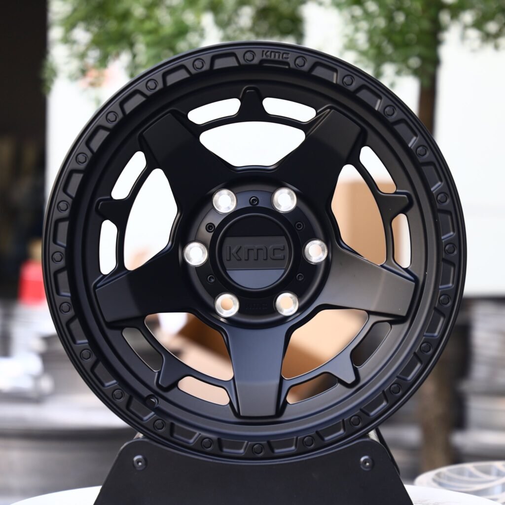 Ford F-150 wheels – KMC Wheels Matte Black Double-Ring Exposed Bolt Detail, front view