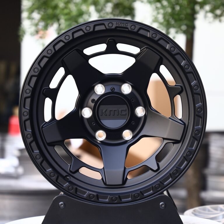 Ford F-150 wheels – KMC Wheels Matte Black Double-Ring Exposed Bolt Detail, front view