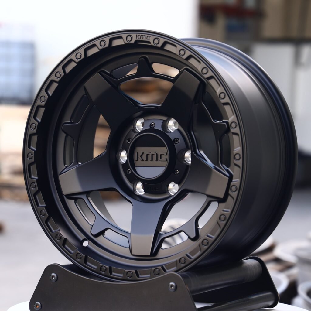 Chevrolet Silverado wheels – KMC Wheels Matte Black Double-Ring Exposed Bolt Detail, angled view