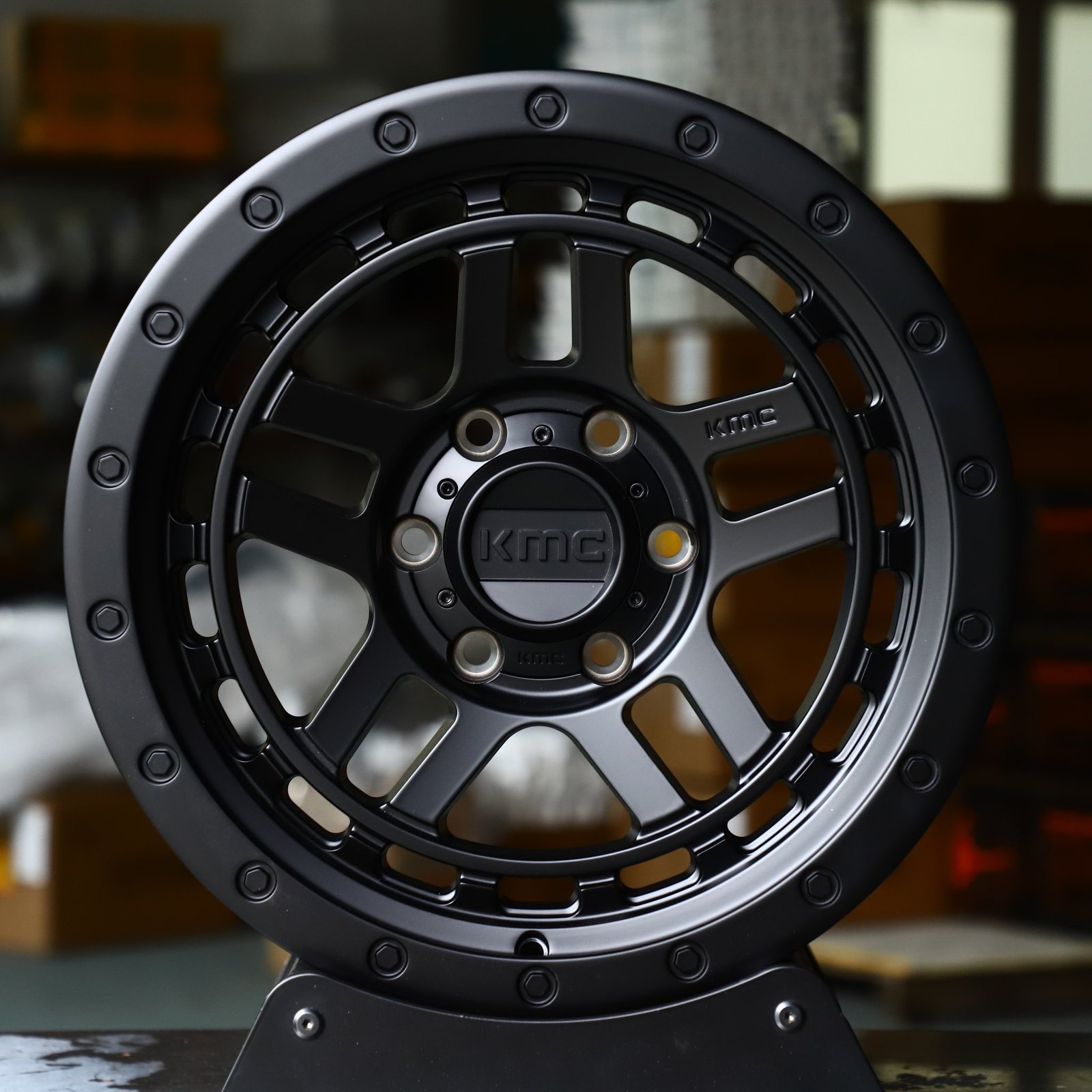 Ford F-150 wheels – KMC Wheels Matte Black Double-Ring Exposed Bolt Detail, front view