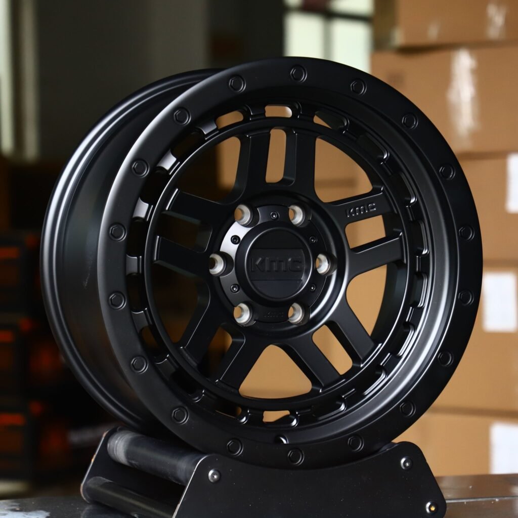 Chevrolet Silverado wheels – KMC Wheels Matte Black Double-Ring Exposed Bolt Detail, angled view