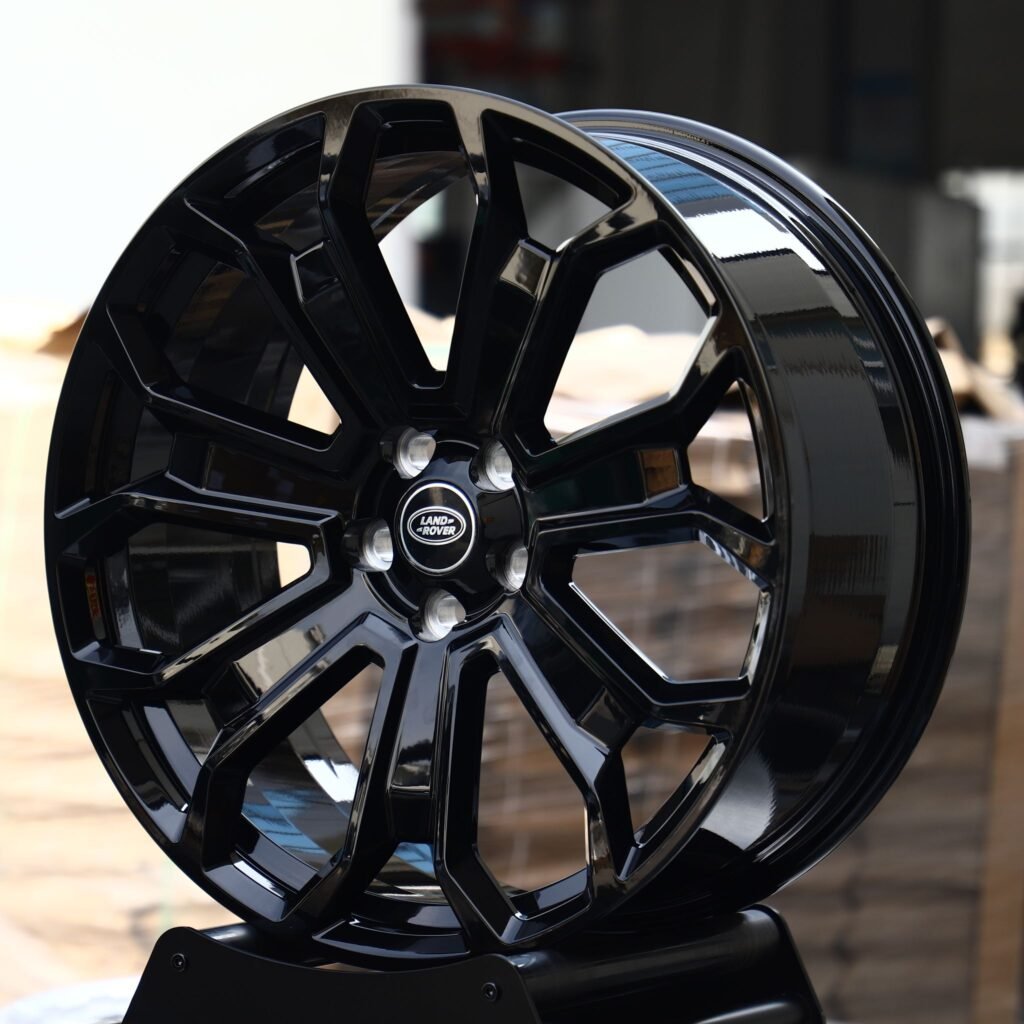 Land Rover Defender wheels – Gloss Black 7 Y-Spoke (Land Rover OEM-Style), angled view