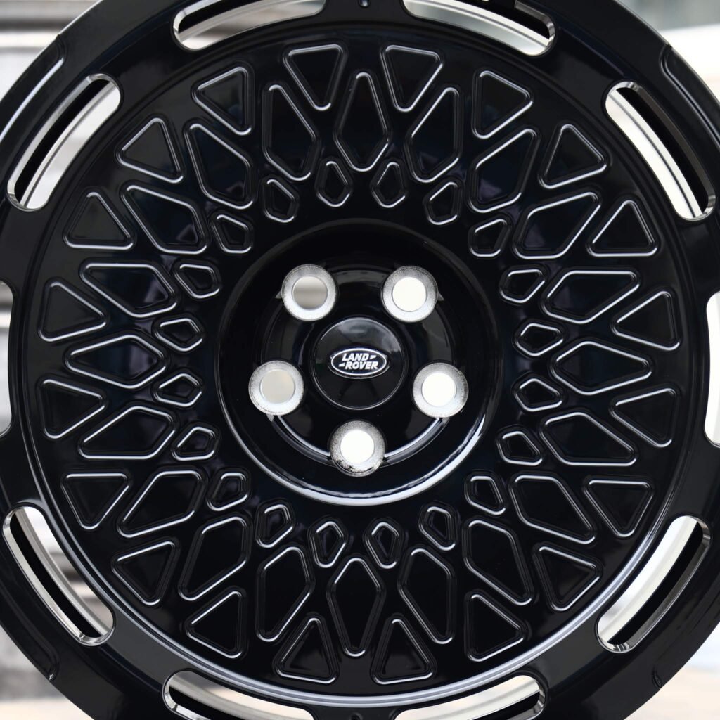 Land Rover Defender wheels – Gloss Black Lattice Mesh (Land Rover OEM-Style), angled view