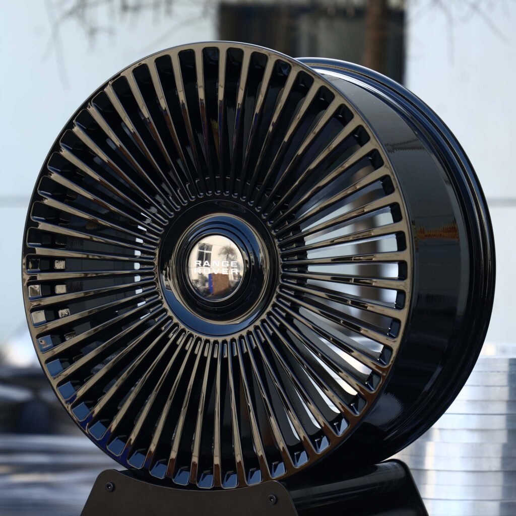 Land Rover Defender wheels – Gloss Black Multi-Spoke (Land Rover OEM-Style), angled view