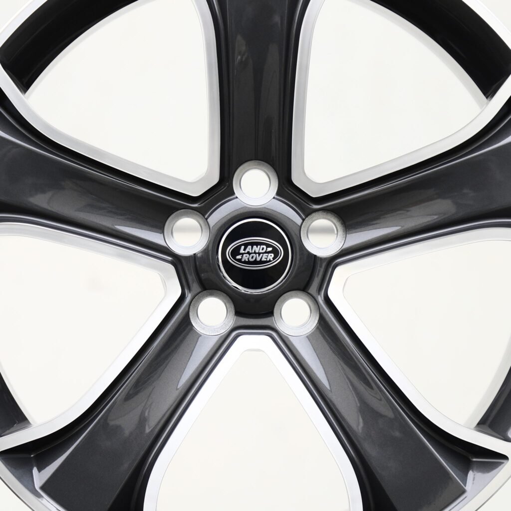 Land Rover Defender wheels – Gunmetal / Machined 5-Spoke (Land Rover OEM-Style), angled view
