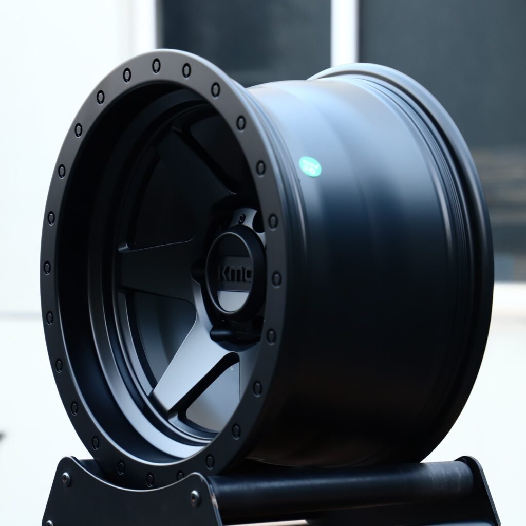 6x135 wheels – Matte Black 6-Spoke Semi-Full-Face Exposed Bolt Detail (KMC-Style), side view