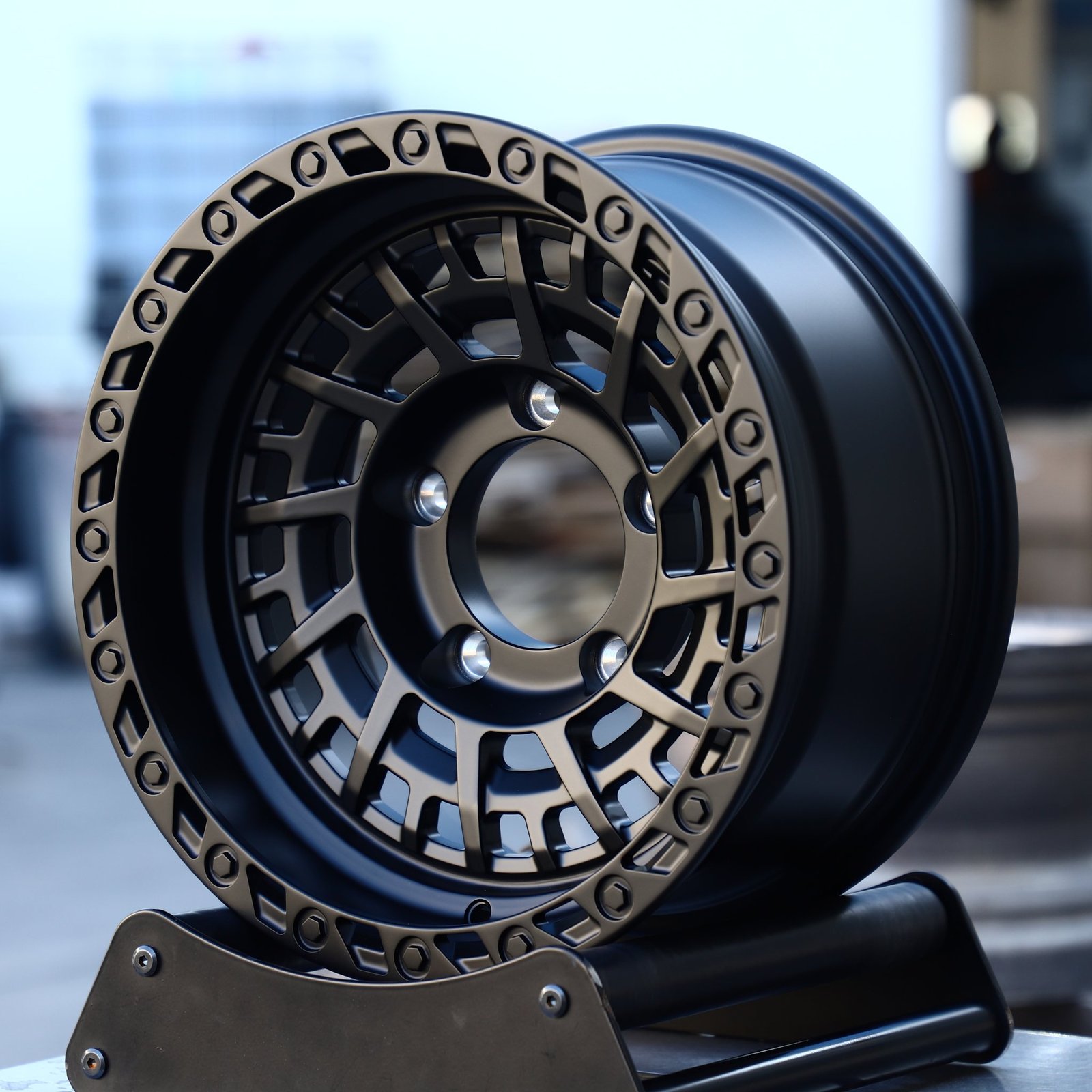 Jeep Wrangler wheels – Matte Black 8-Spoke Bolt-Ring, front view