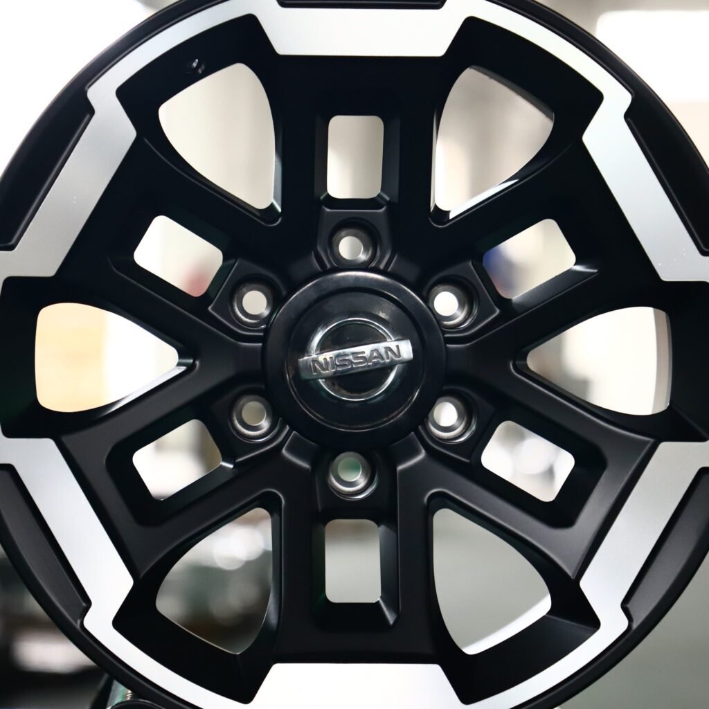 Nissan Titan wheels – Matte Black Custom (Nissan OEM-Style), lip and barrel detail