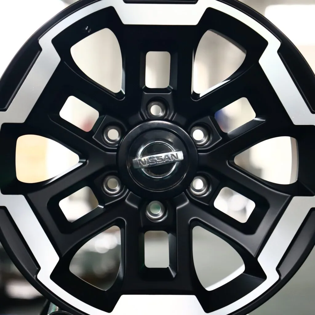 Nissan Titan wheels – Matte Black Custom (Nissan OEM-Style), lip and barrel detail
