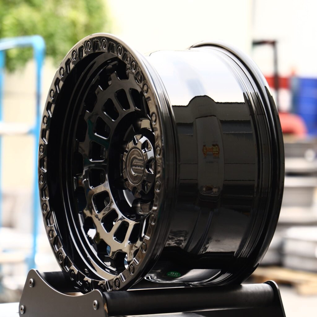 8x165.1 wheels – Matte Black Double-Ring Exposed Bolt Detail, side view