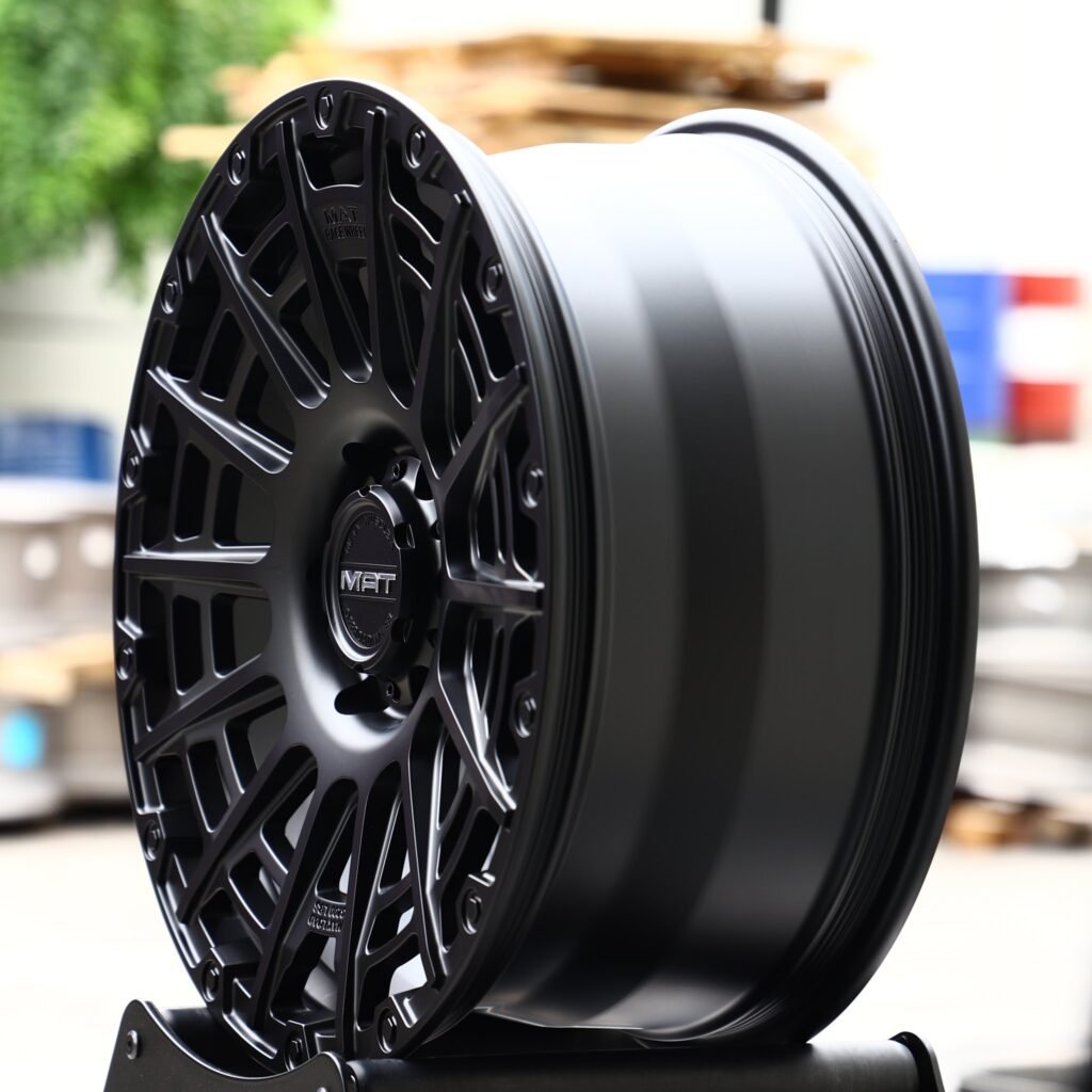 Toyota Tacoma wheels – Matte Black Exposed Bolt Detail Double Ring Lip, angled view