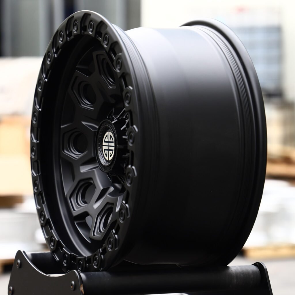 6x135 wheels – Matte Black Exposed Bolt Detail, side view