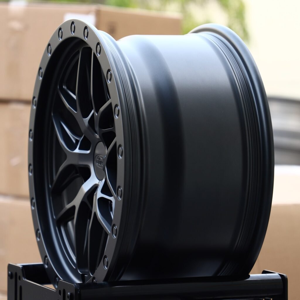 6x135 wheels – Matte Black Exposed Bolt Detail, side view