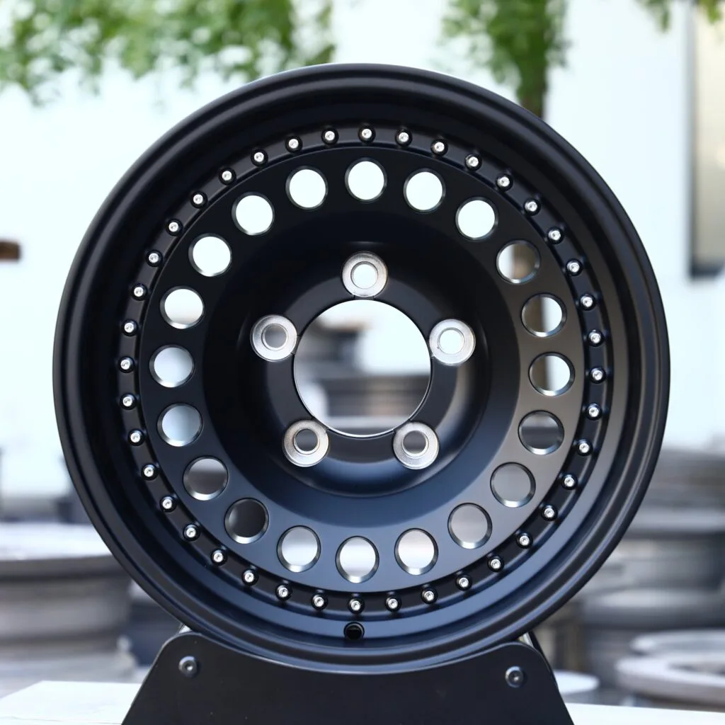 Jeep Wrangler wheels – Matte Black Semi-Full-Face Riveted, front view