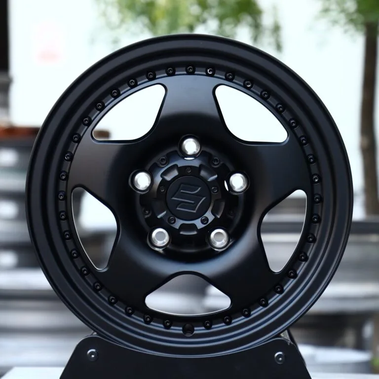 Suzuki Jimny wheels – Matte Black Semi-Full-Face Riveted Wide Lip, front view