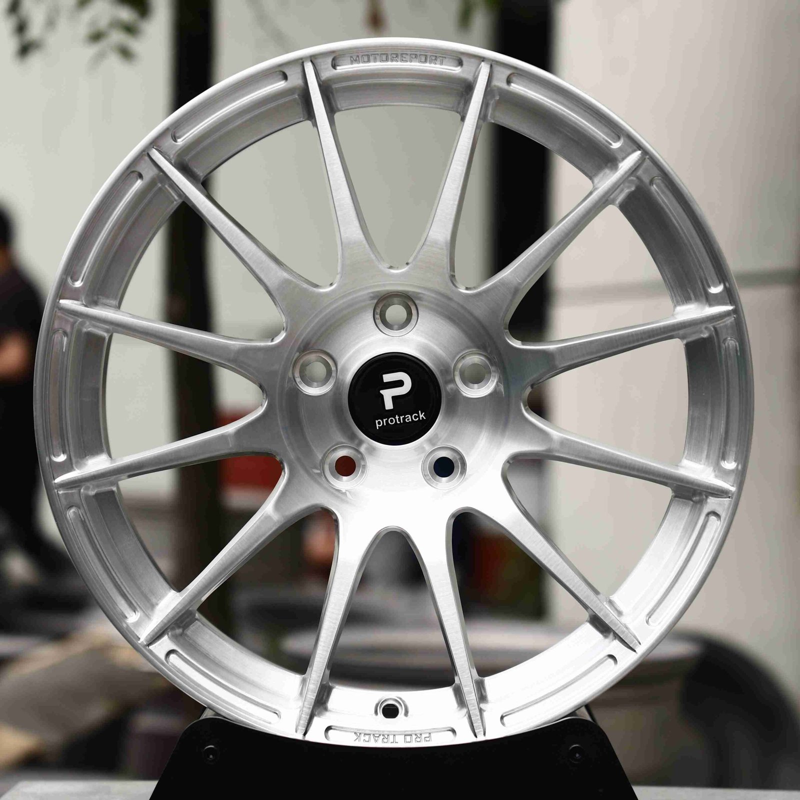 Toyota GR86 wheels – Matte Silver 12-Spoke, front view
