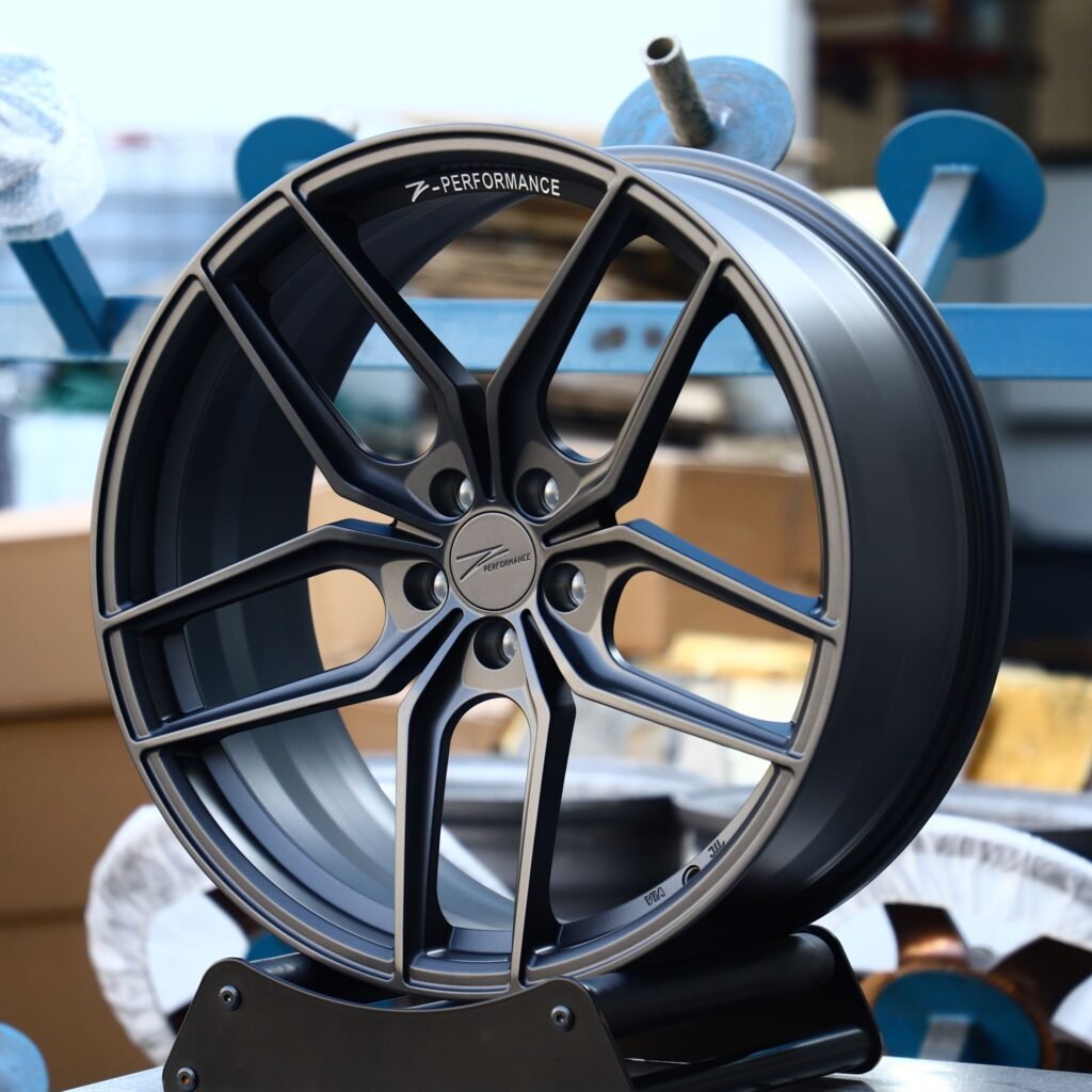 Tesla Model Y wheels – Matte Silver Petal, angled view