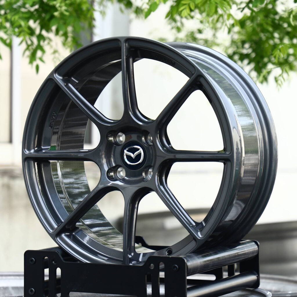 Mazda CX-30 wheels – Gunmetal 10-Spoke (Mazda OEM-Style), angled view