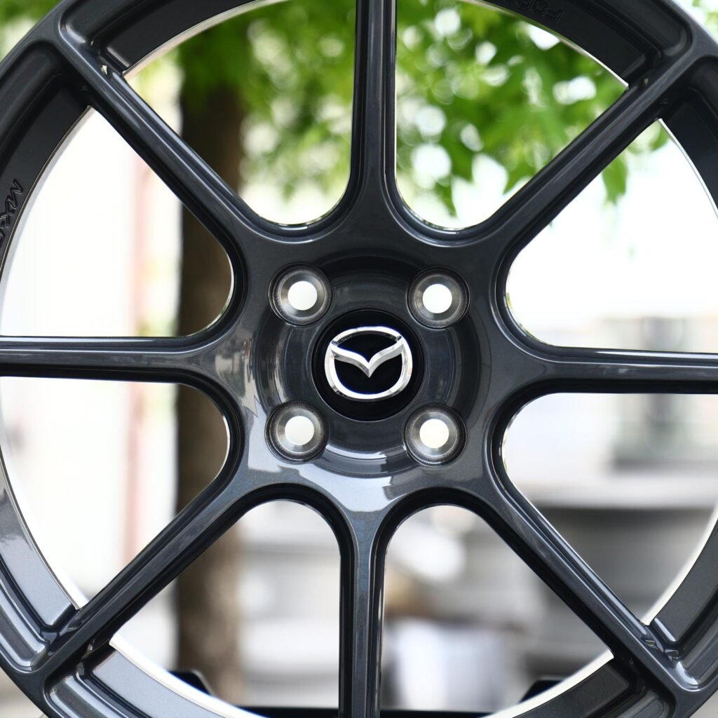 Mazda MX-5 wheels – Gunmetal 10-Spoke (Mazda OEM-Style), lip and barrel detail