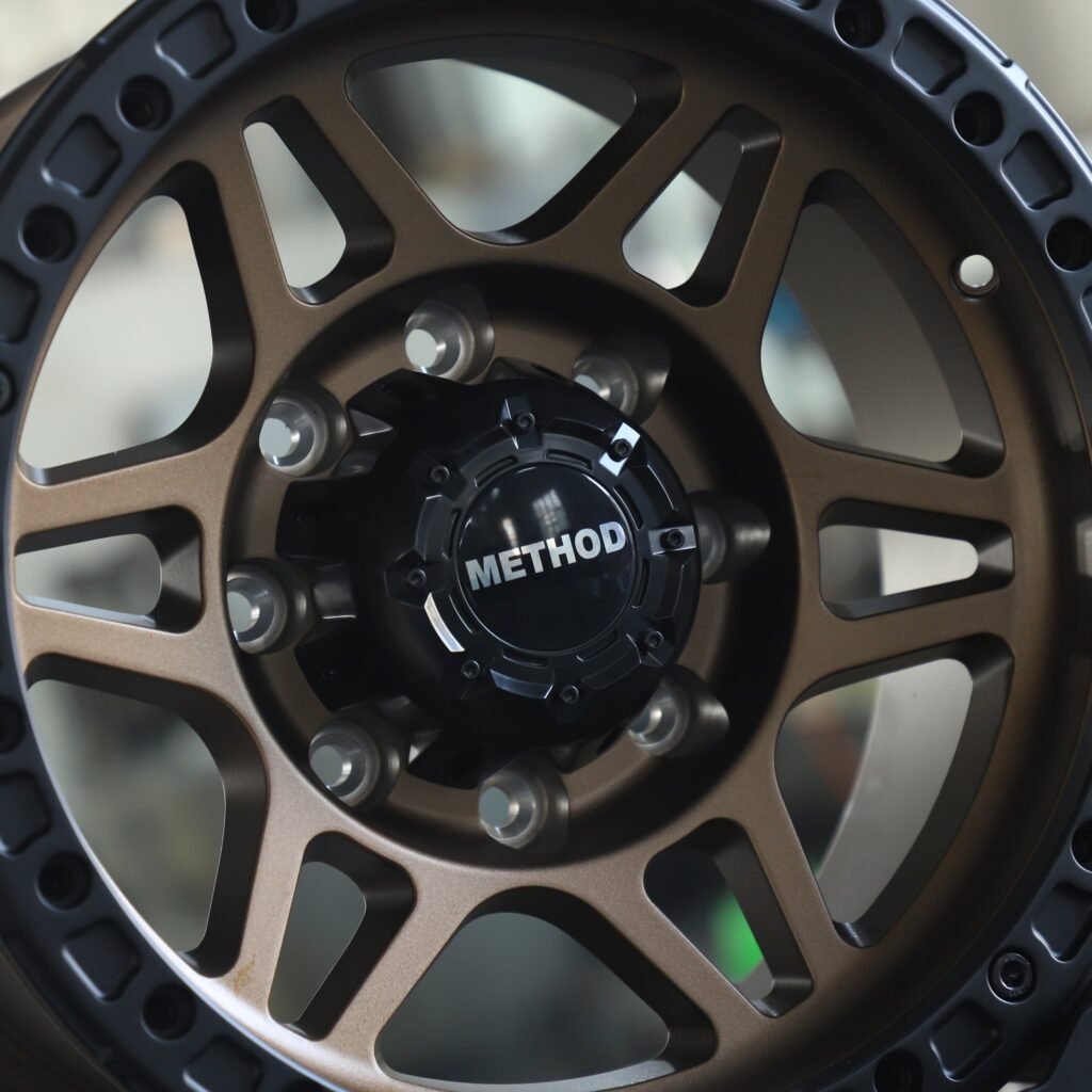 Method Bronze / Gloss Black Custom Beadlock Forged Wheels - Ram 2500 / Chevrolet Silverado 2500HD Fitment (8-Lug) view 4