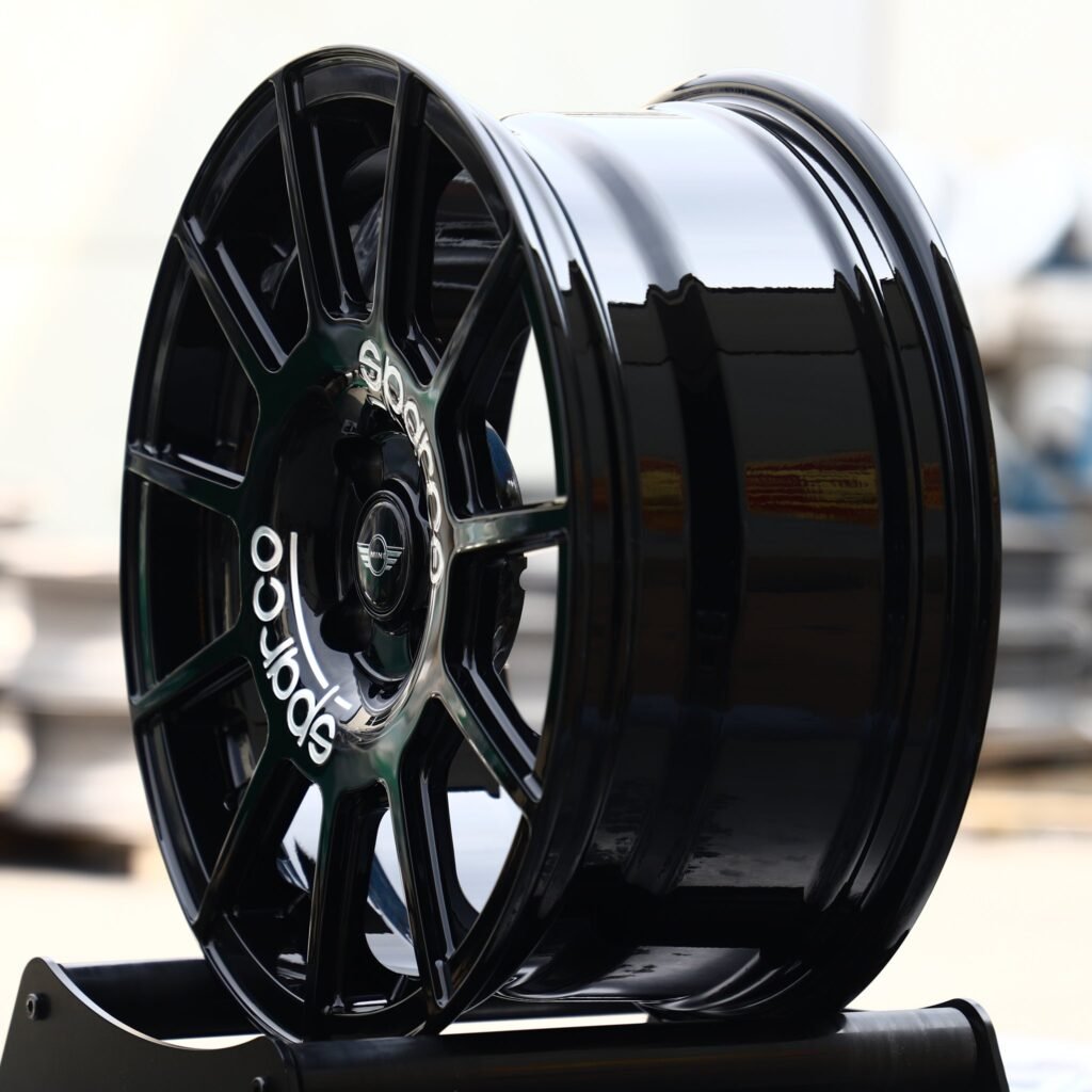 4x100 wheels – Gloss Black 12-Spoke (Mini OEM-Style), side view