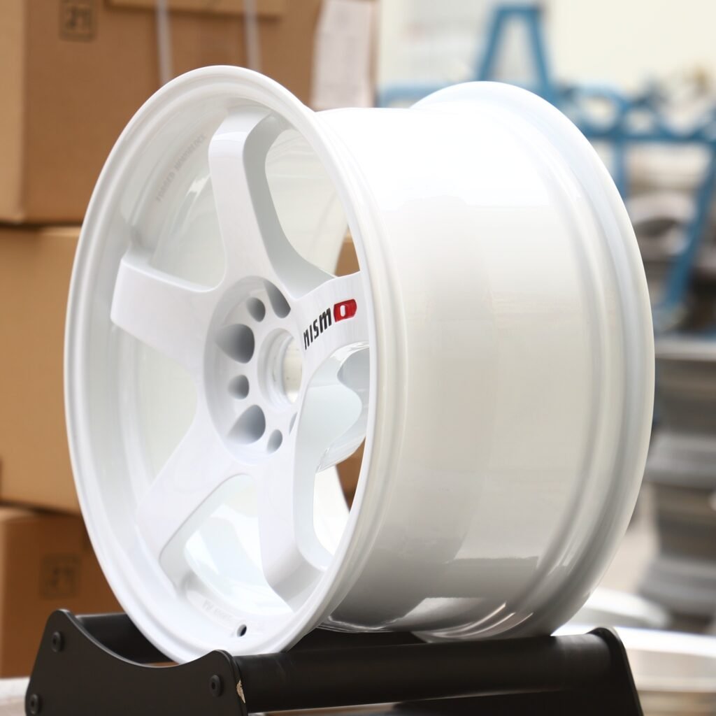 5x130 wheels – Nissan Nismo Gloss White 5-Spoke, side view