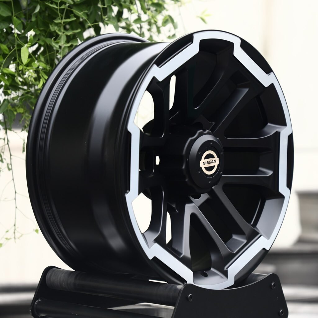 6x139.7 wheels – Black / Machined 6 Y-Spoke (Nissan OEM-Style), side view