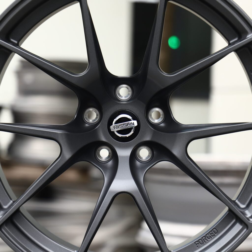 Nissan 350Z wheels – Gunmetal 5 Y-Spoke (Nissan OEM-Style), lip and barrel detail
