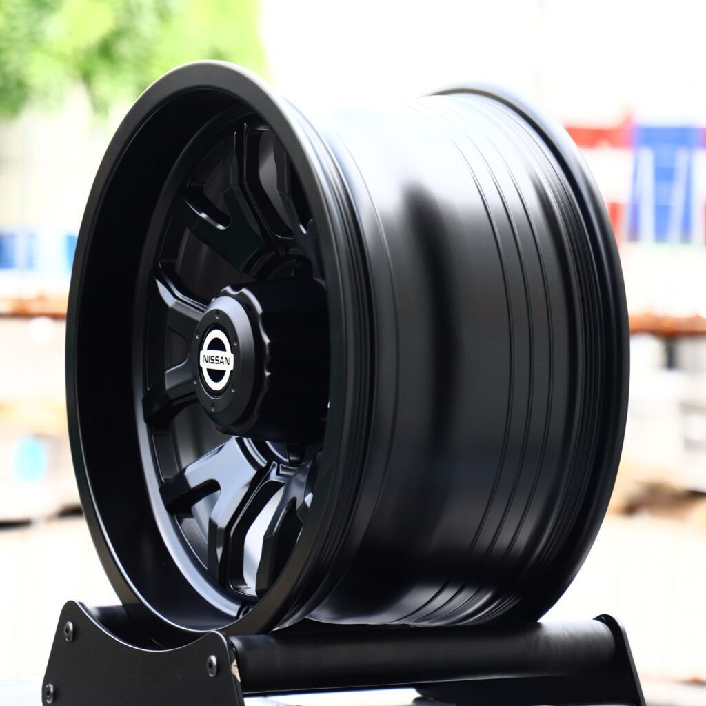 6x139.7 wheels – Gloss Black 6 Y-Spoke (Nissan OEM-Style), side view
