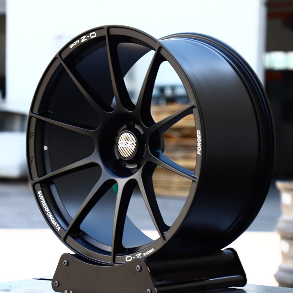 Subaru WRX wheels – O.Z Racing Gloss Black 10-Spoke Racing, angled view