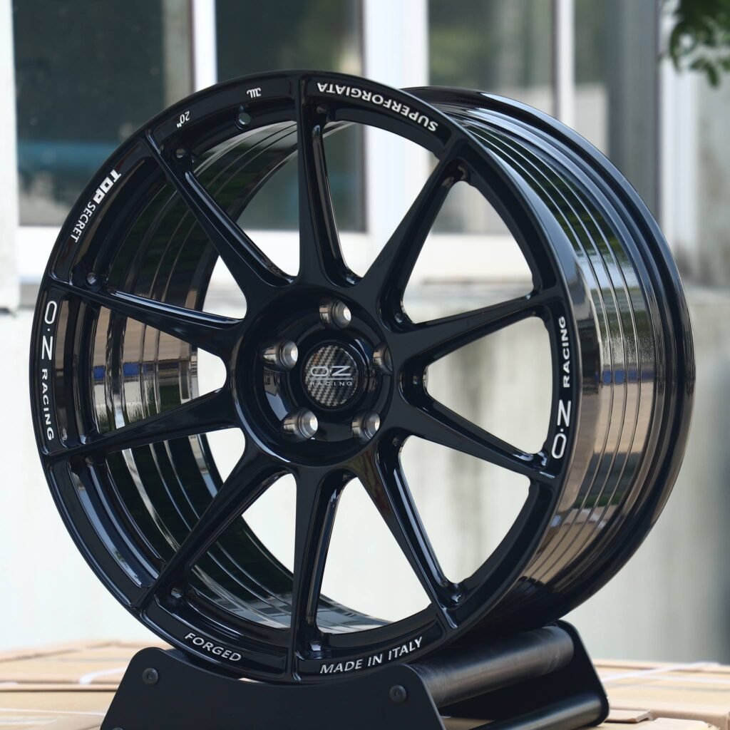 Subaru WRX wheels – OZ Racing Gloss Black 10-Spoke, angled view