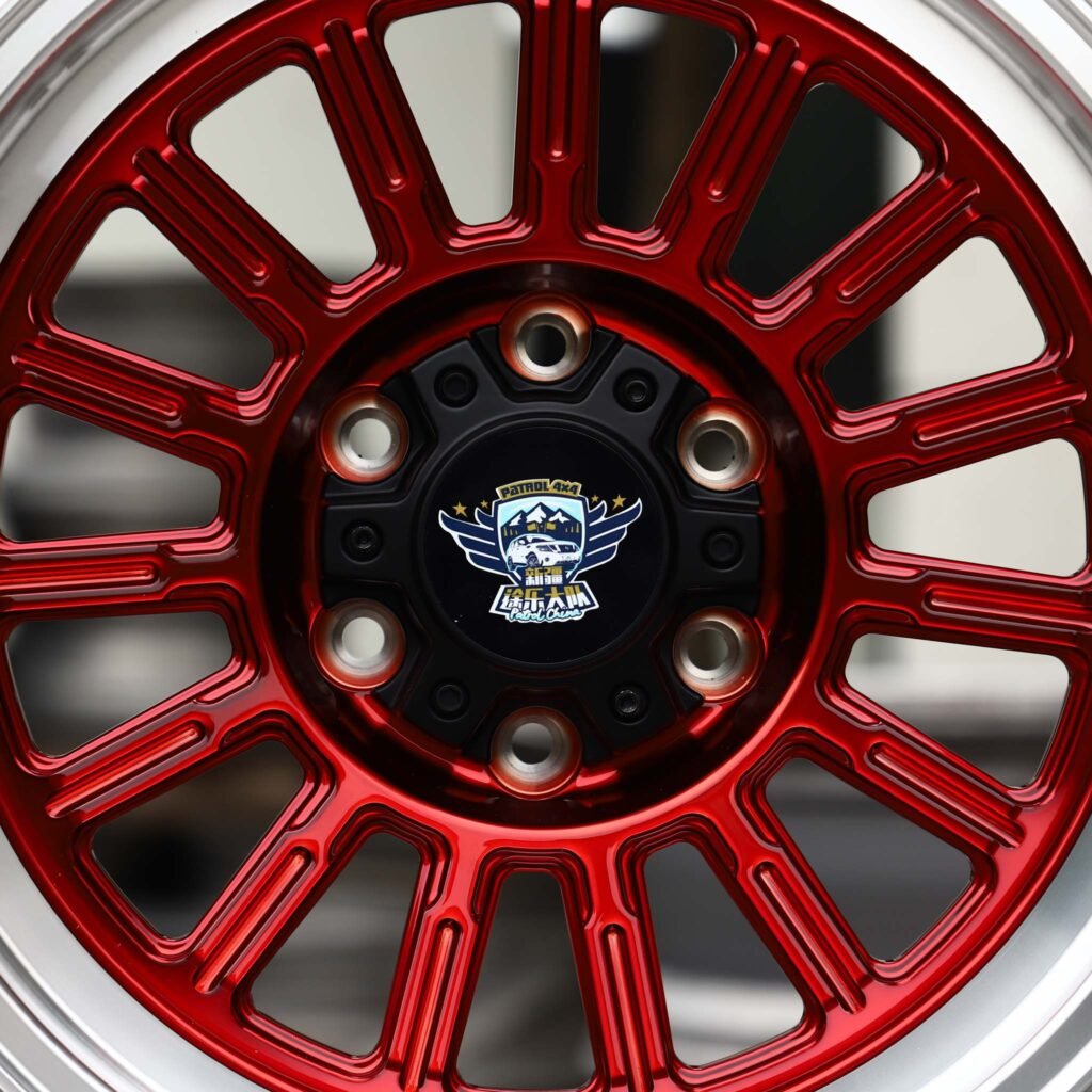 Toyota Tacoma wheels – Candy Red 16-Spoke Polished Lip (Patrol 4×4-Style), lip and barrel detail