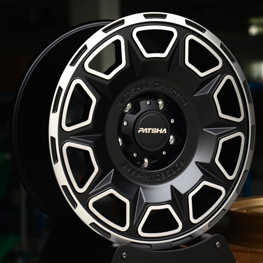 Toyota Tacoma wheels – Patsha Gloss Black Machined Face, angled view