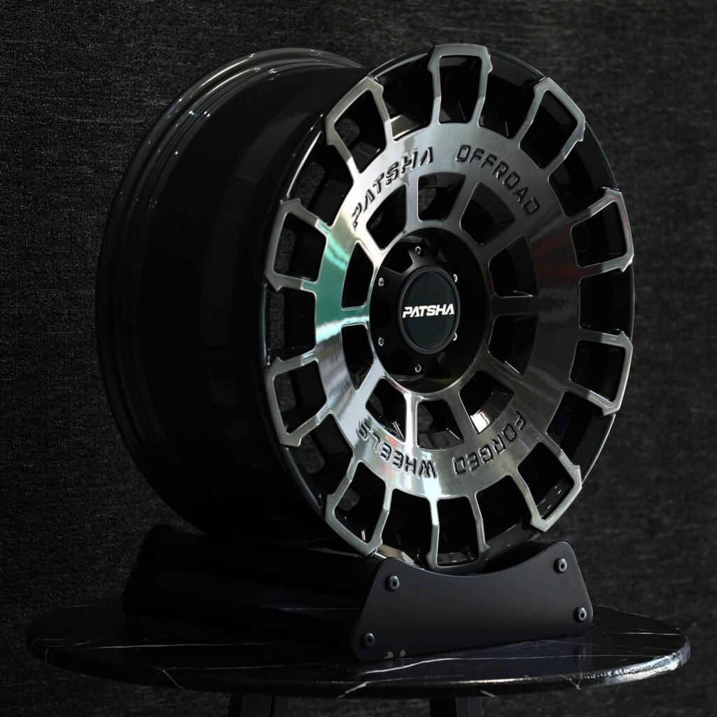 Toyota Tacoma wheels – Patsha Transparent Gray Double Ring Lip, angled view