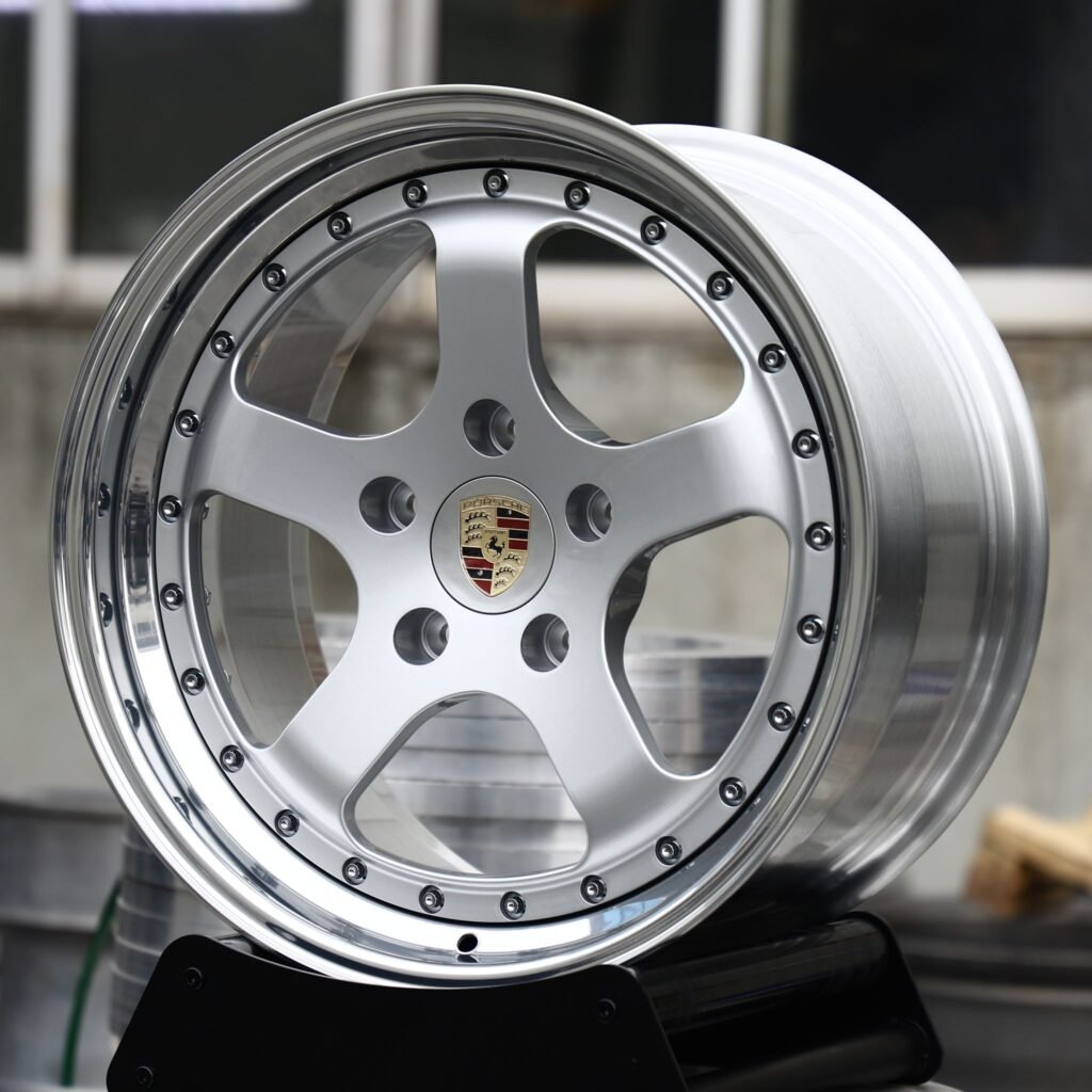 Porsche 718 Cayman wheels – Bright Silver 5-Spoke Deep Dish 2-Piece (Porsche OEM-Style), angled view