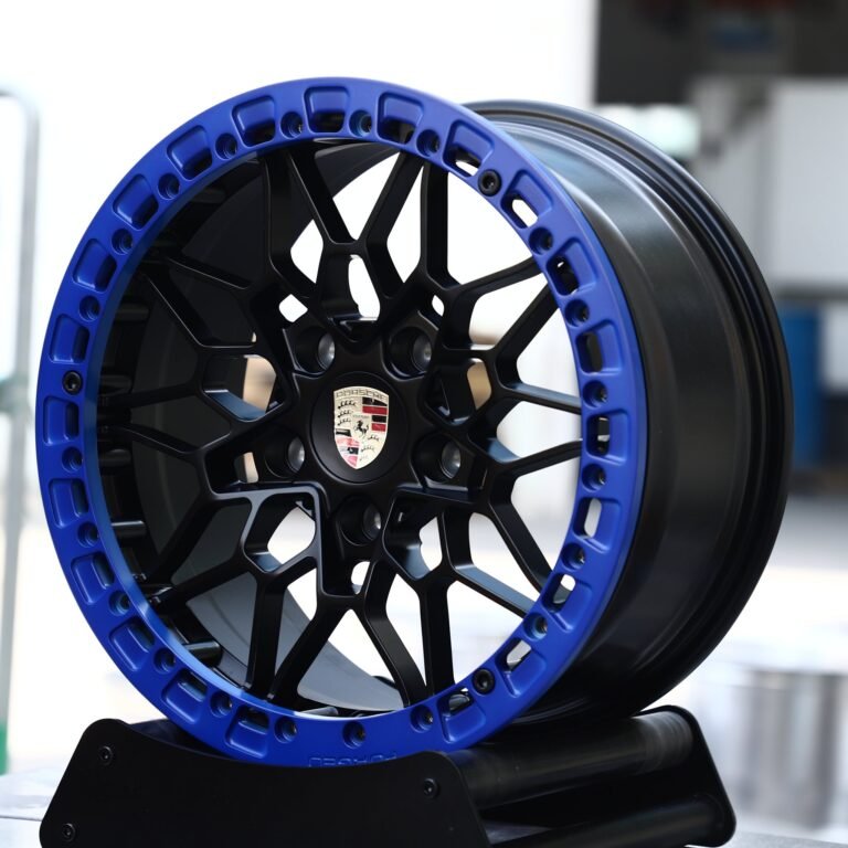 Porsche 911 wheels – Gloss Black Mesh Blue-Ring Beadlock (Porsche OEM-Style), front view