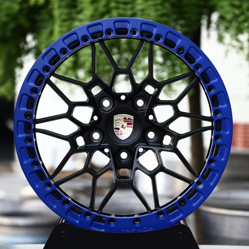 5x130 wheels – Gloss Black Mesh Blue-Ring Beadlock (Porsche OEM-Style), side view