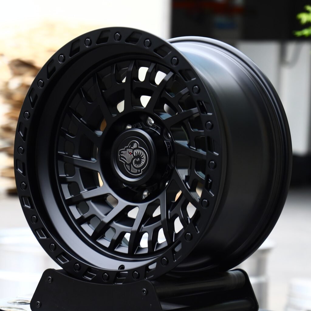 Ram 2500 wheels – Matte Black Spiral Multi-Spoke Beadlock (Ram OEM-Style), angled view