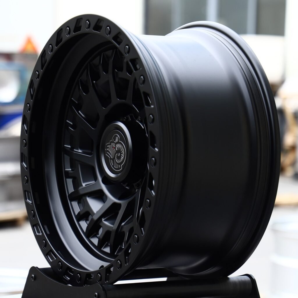 8x165.1 wheels – Matte Black Spiral Multi-Spoke Beadlock (Ram OEM-Style), side view