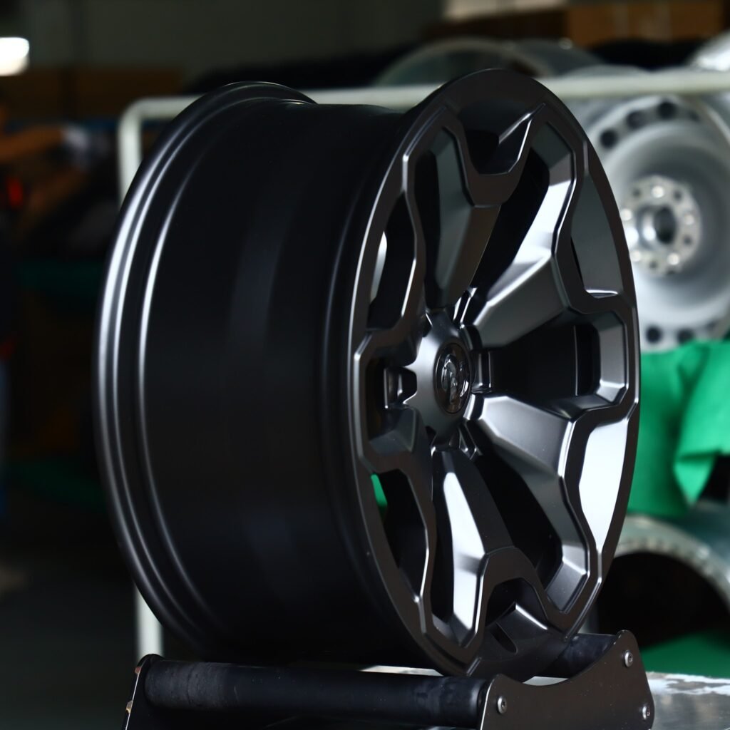 Ram 1500 wheels – Gloss Black Petal OE Replica (Ram OEM-Style), angled view