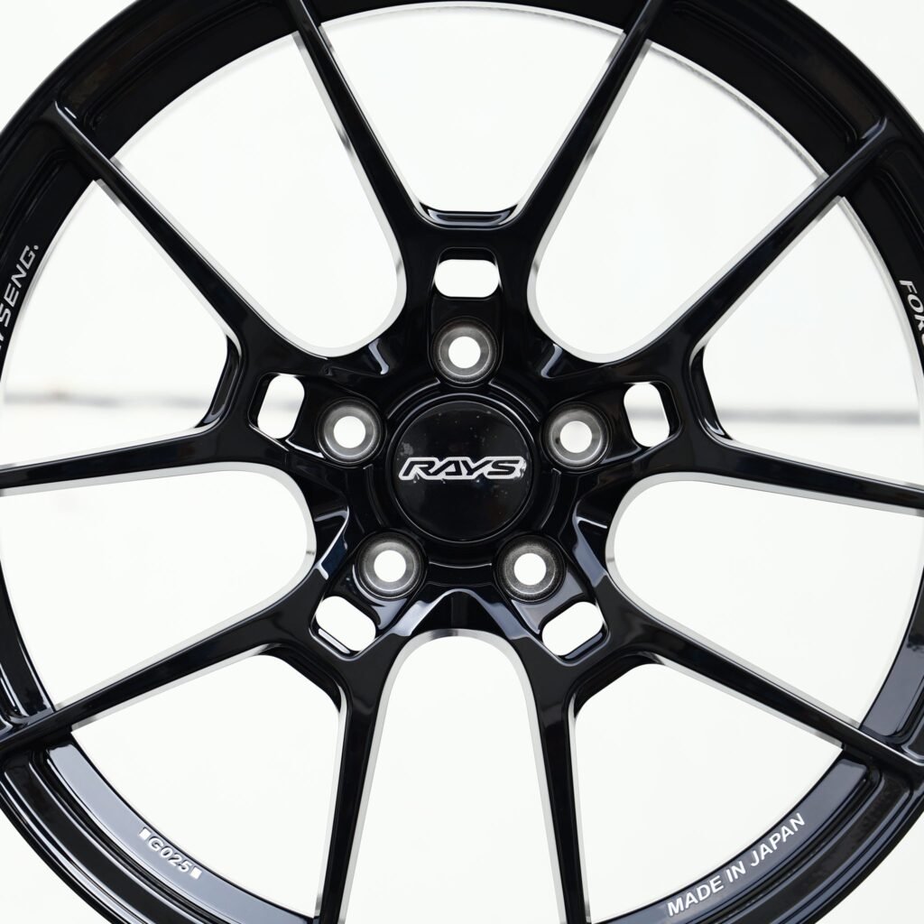 Toyota GR Supra wheels – Gloss Black 5 Y-Spoke (Rays-Style), lip and barrel detail