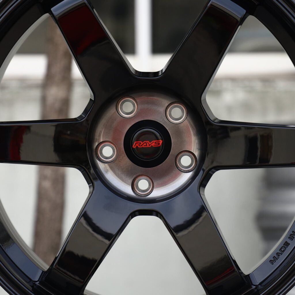 Toyota GR Supra wheels – Gloss Black 6-Spoke (Rays-Style), lip and barrel detail