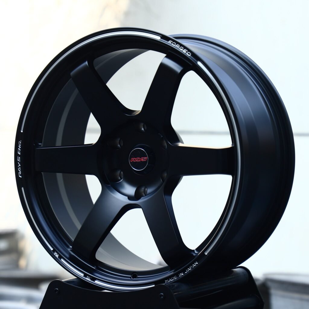 6x139.7 wheels – Matte Black 6-Spoke (Rays-Style), side view