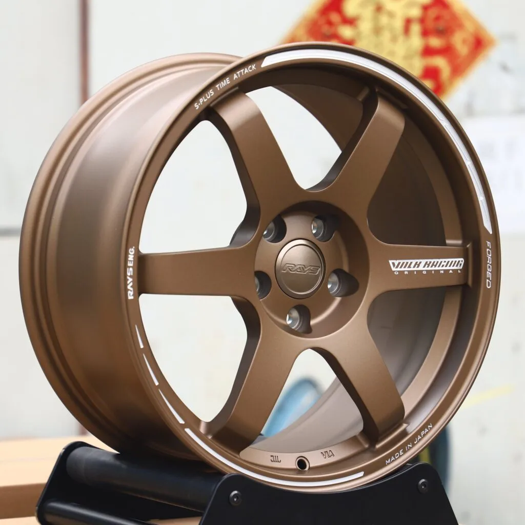 Subaru WRX wheels – Bronze 6-Spoke (Rays Volk Racing TE37-Style), angled view