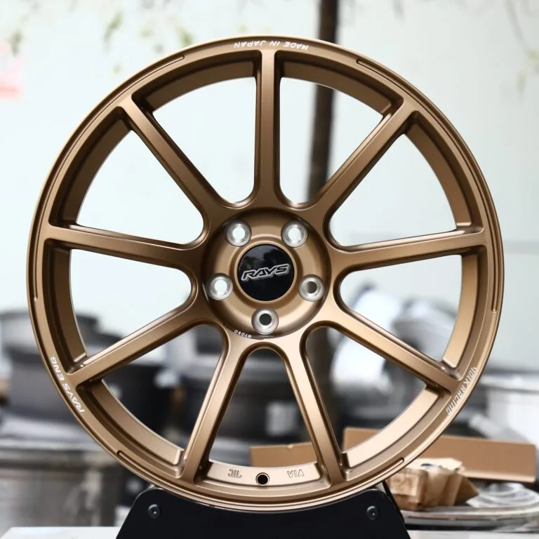 Nissan 370Z wheels – Rays Volk Racing Bronze 9-Spoke Side-Milled, front view