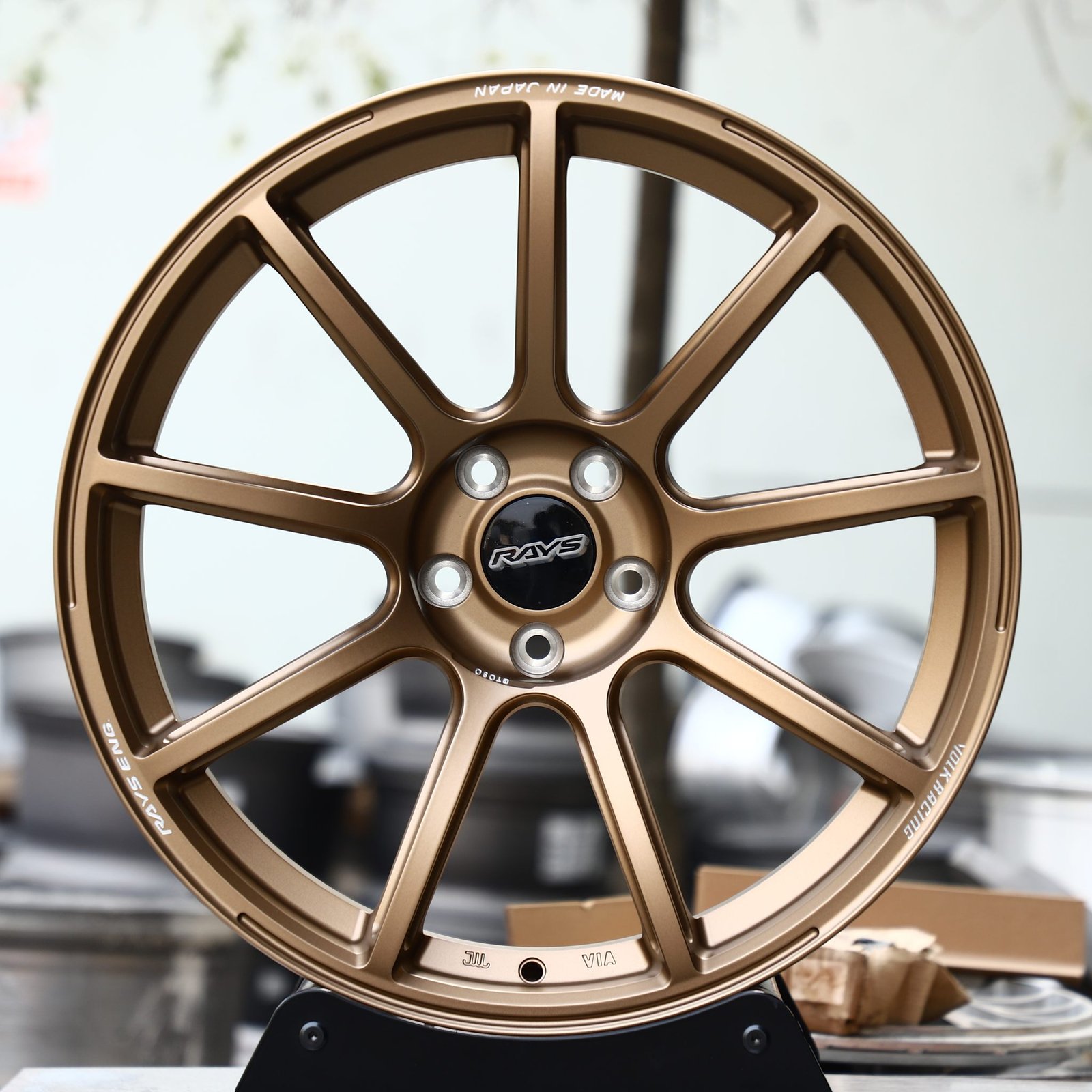 Nissan 370Z wheels – Rays Volk Racing Bronze 9-Spoke Side-Milled, front view