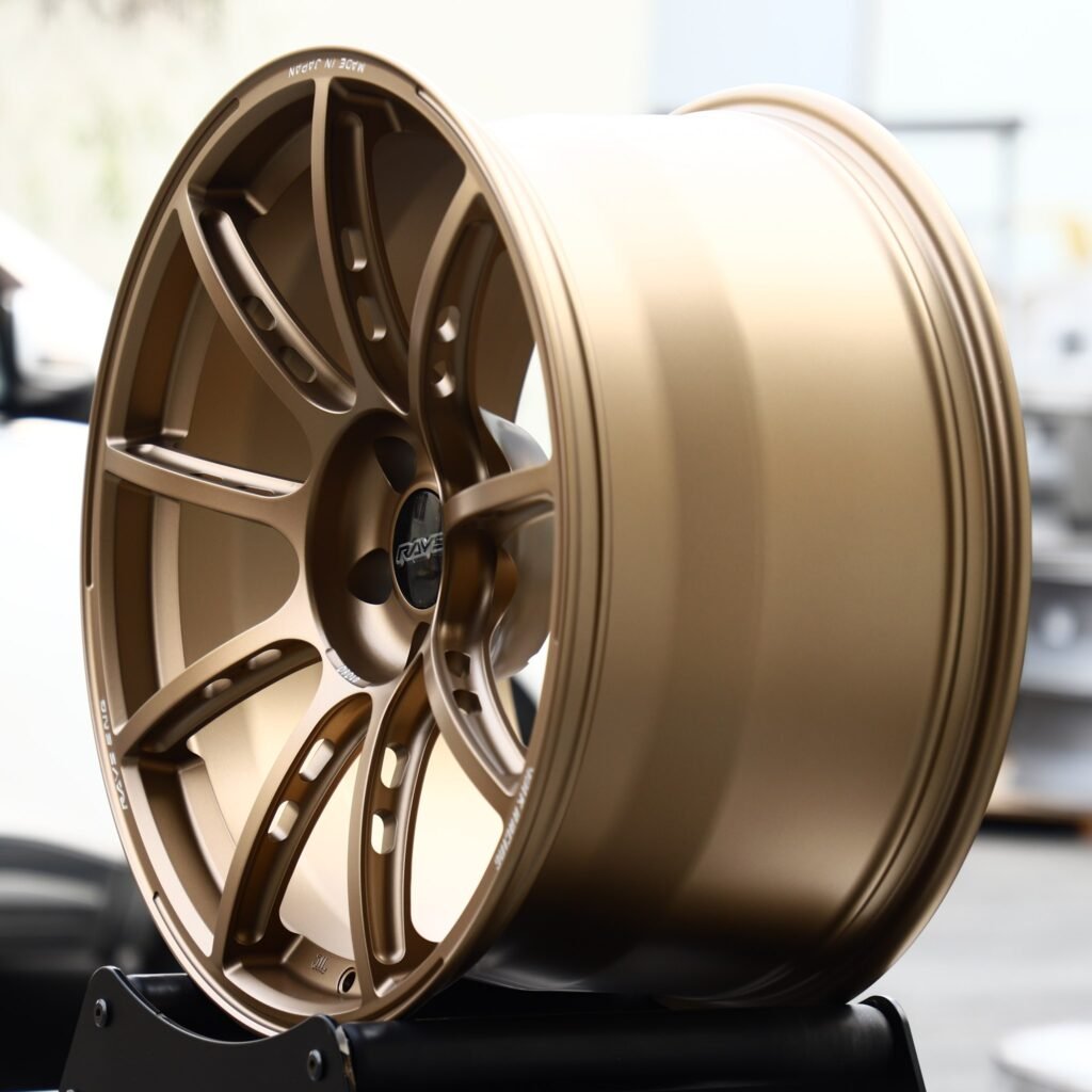 5x114.3 wheels – Rays Volk Racing Bronze 9-Spoke Side-Milled, side view