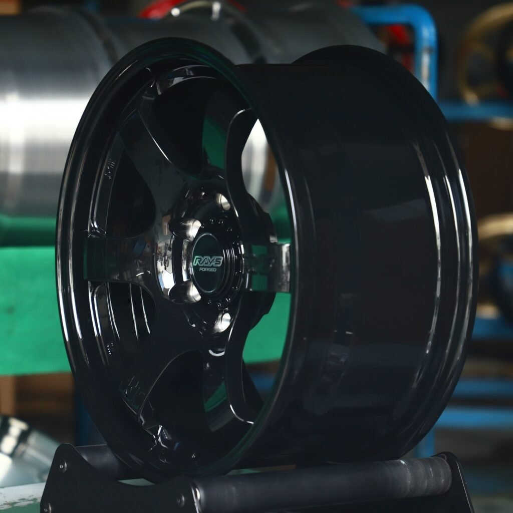6x139.7 wheels – Rays Volk Racing Gloss Black 6-Spoke, side view