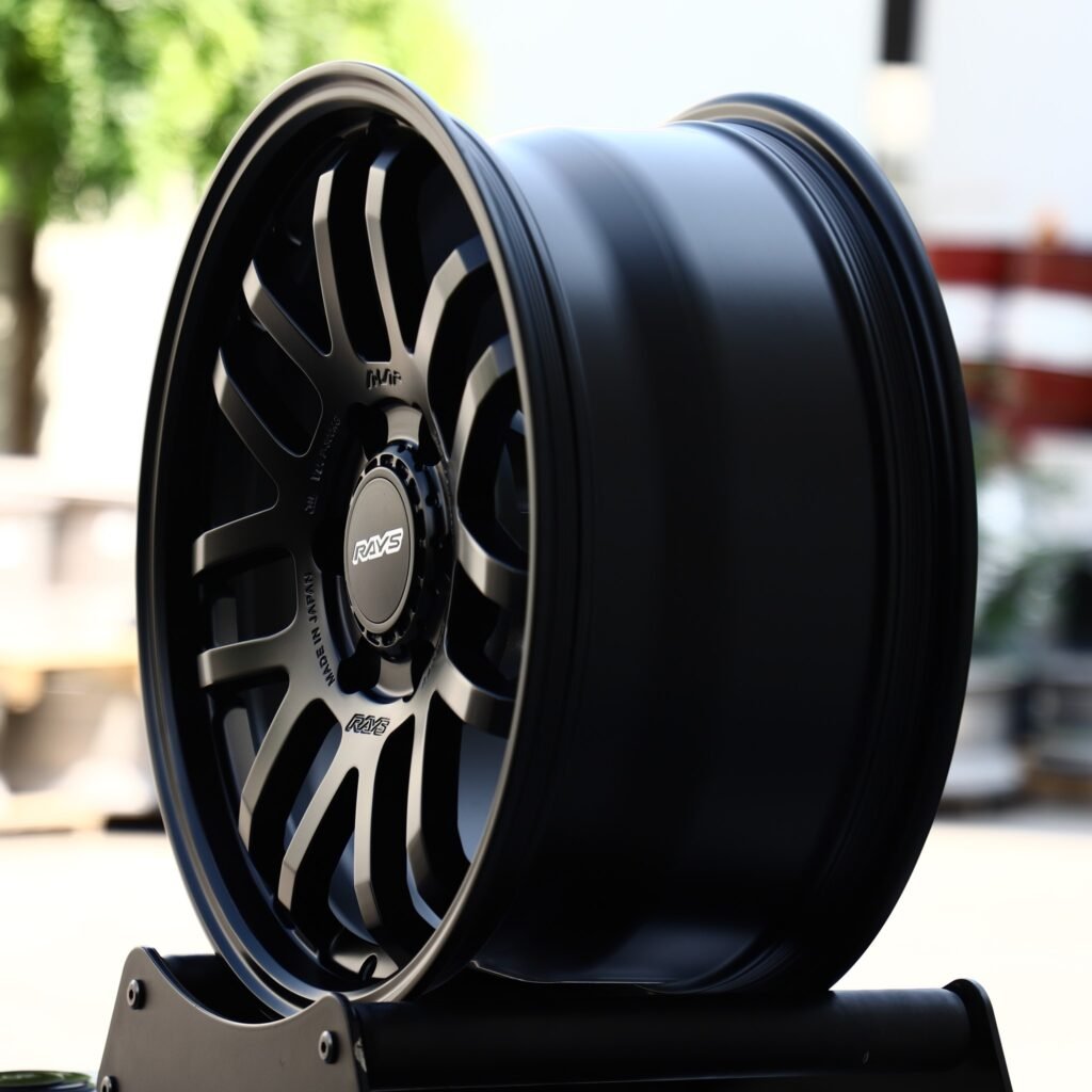 6x139.7 wheels – Rays Volk Racing Gloss Black 7 Y-Spoke Deep Lip, side view