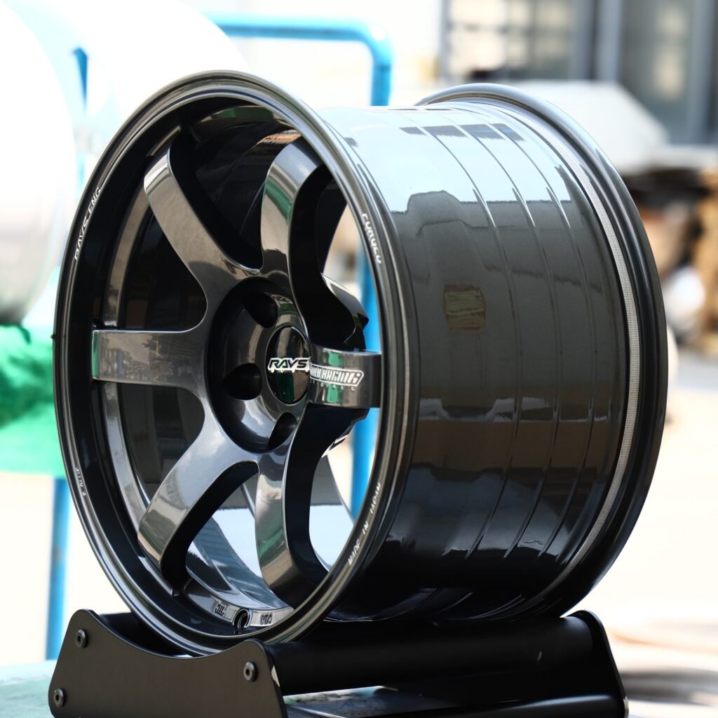 5x100 wheels – Gloss Black / Gunmetal 6-Spoke (Rays Volk Racing TE37-Style), side view